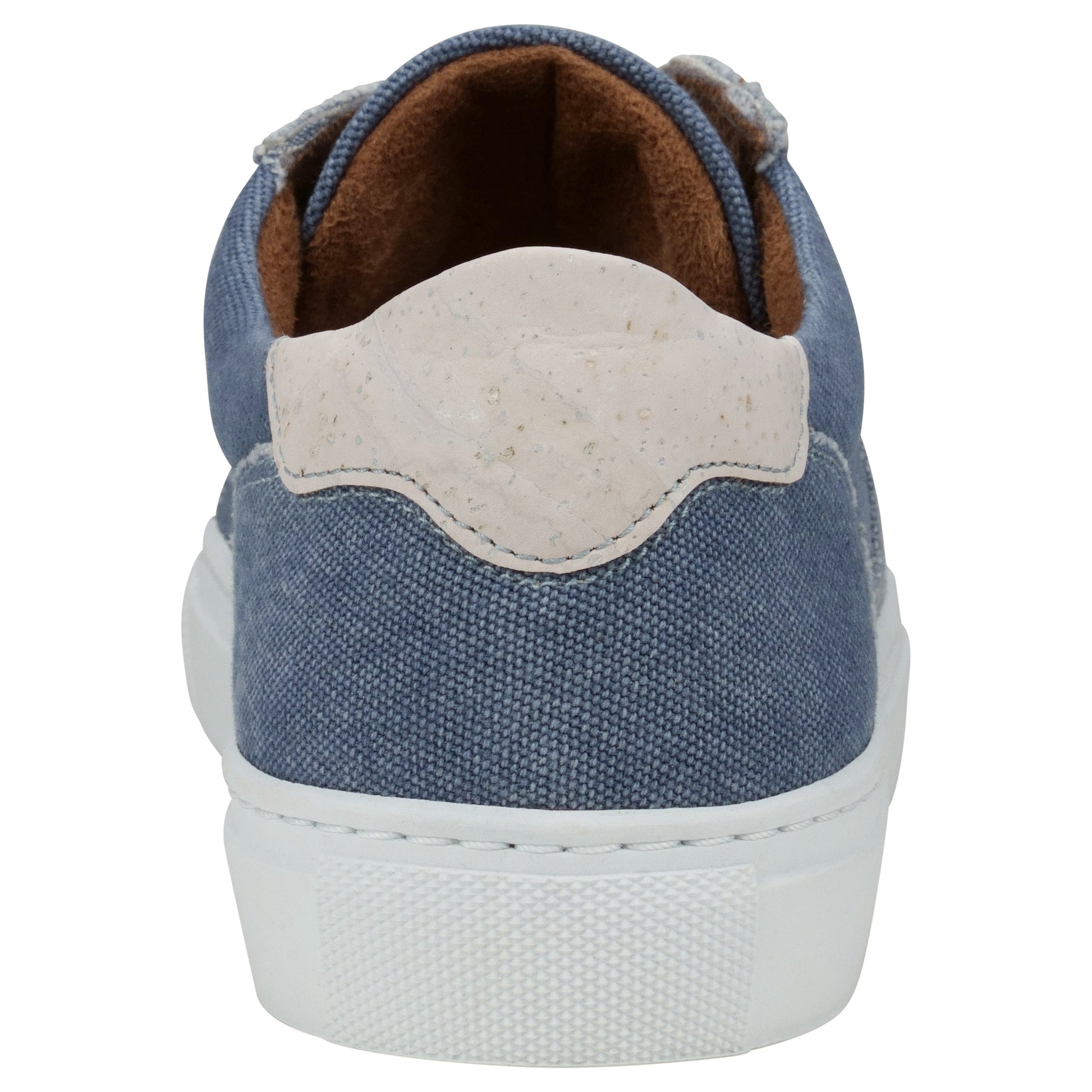 Close up back view denim sneaker with white cork counter